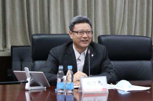 錢智民拜訪中國建材黨委書記、董事長周育先