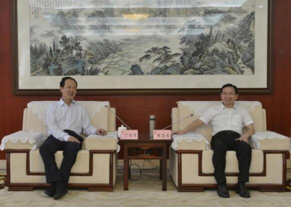 丁焰章拜會南昌市委副書記、市長黃喜忠