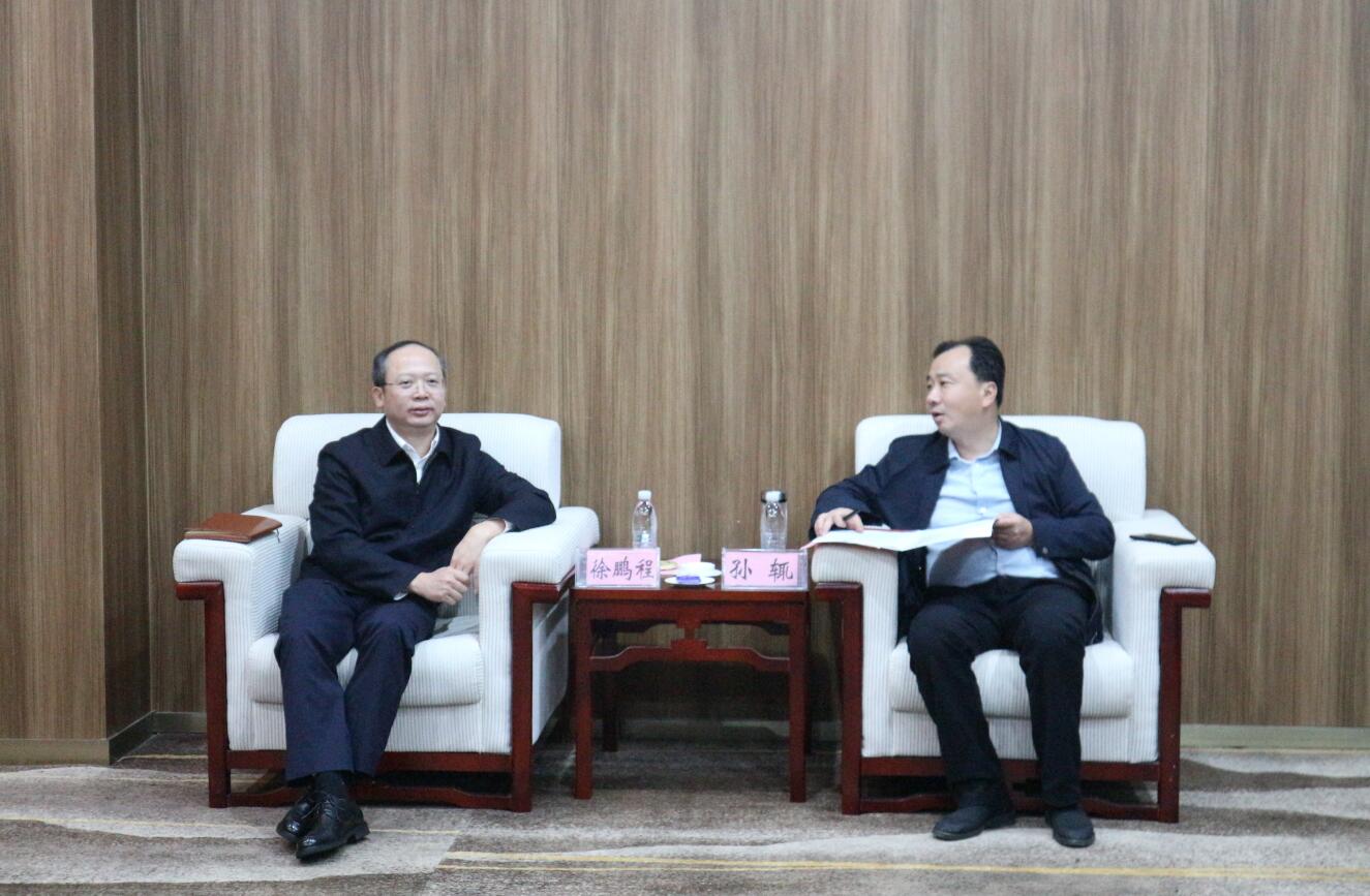 徐鵬程與湖北大冶市委副書記、市長孫輒座談