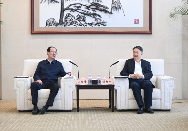 丁焰章與中國華能董事長、黨組書記溫樞剛會談