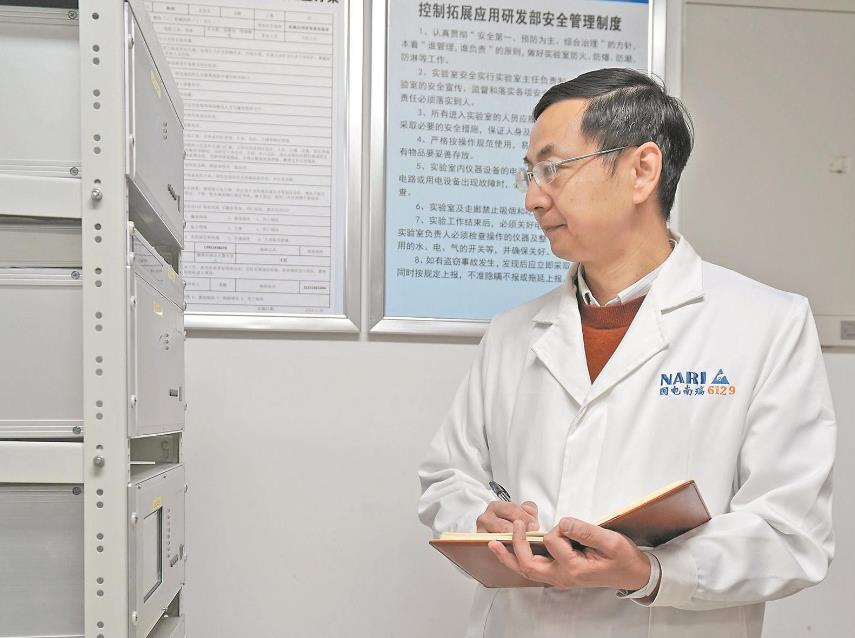 【國網(wǎng)特等勞?！坷钔簽榇箅娋W(wǎng)安全穩(wěn)定運行添“利器”